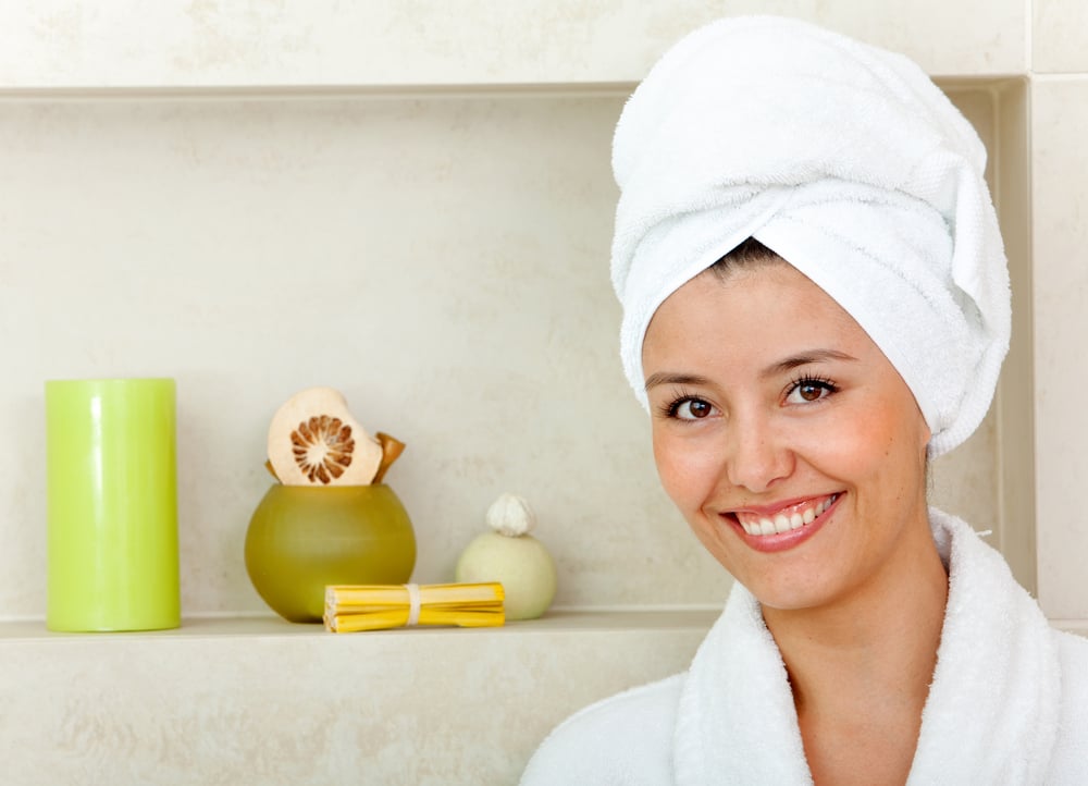 Beauty female portrait with a towel on her head